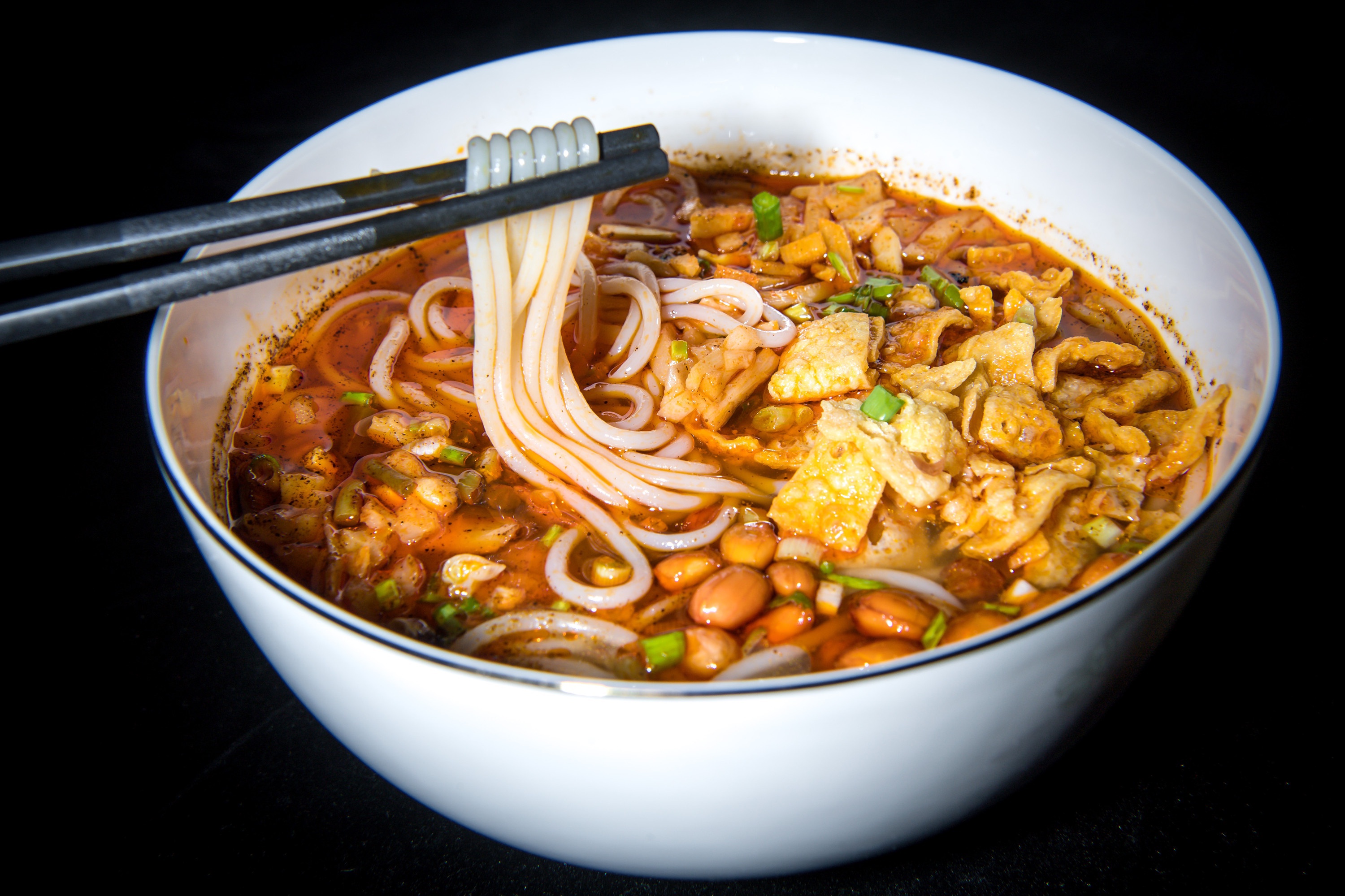 Luosifen, or river snail rice noodles, is an iconic dish known for its pungent smell in the southern Chinese city of Liuzhou. /IC photo