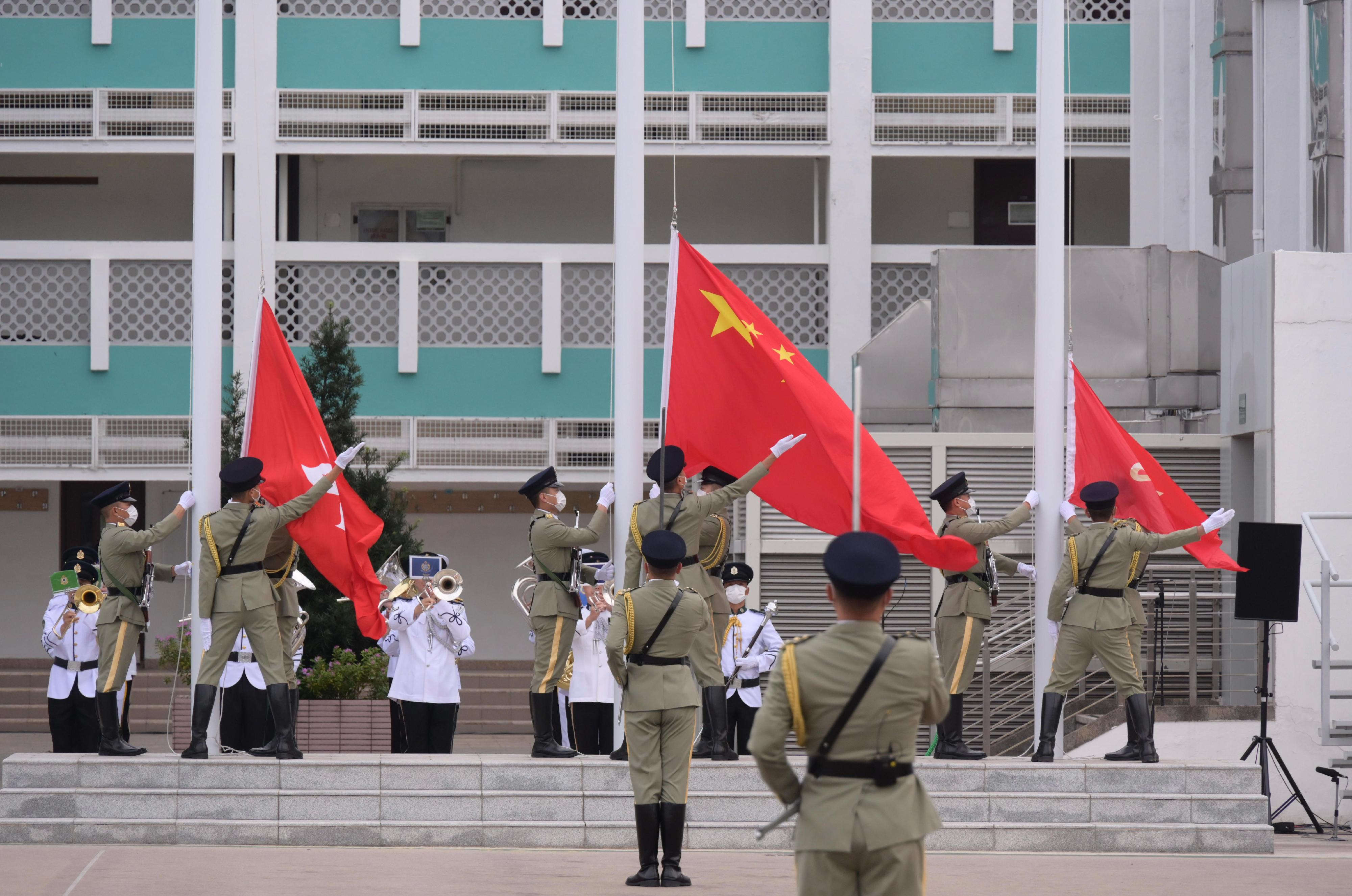 香港保安局12月4日举行升旗仪式。