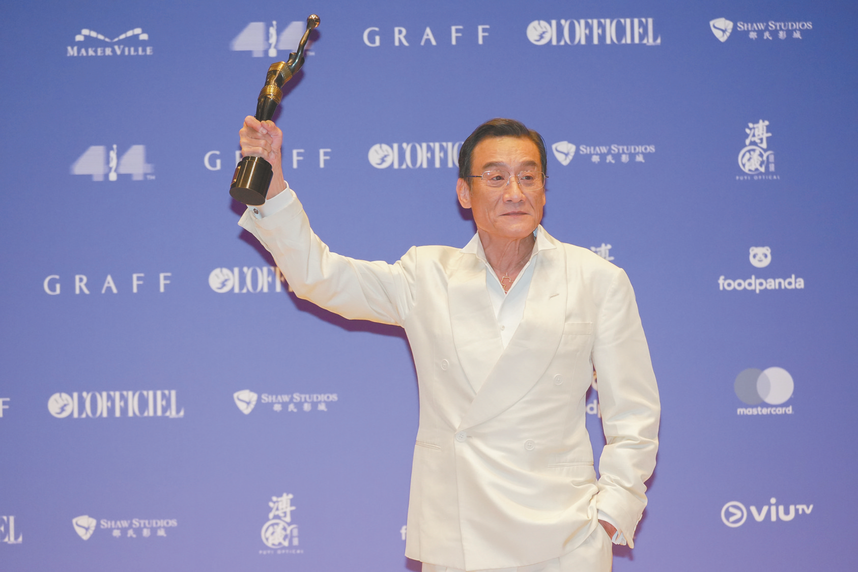 梁家辉获金像奖最佳男主角奖。（视觉中国）