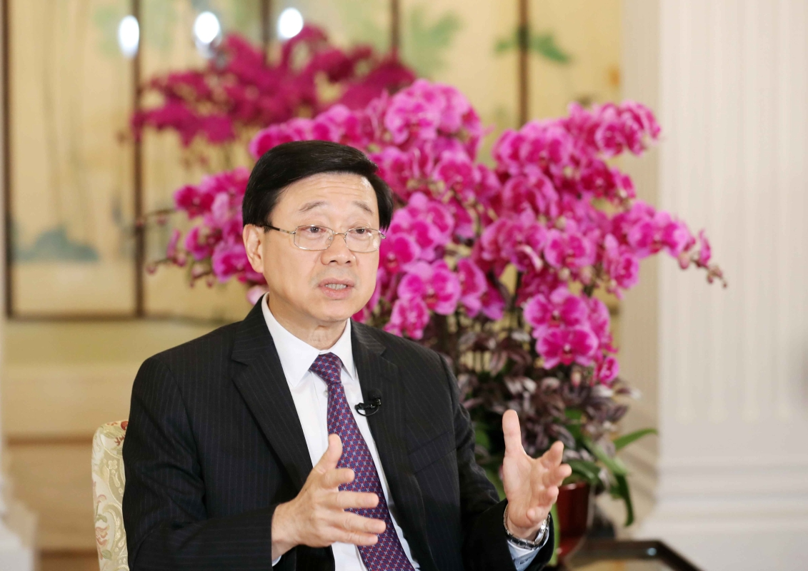 李家超6月21日接受香港中通社采访。(图片来源:香港新闻网)