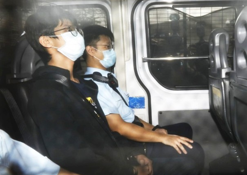 钟翰林被押往法庭提讯（图片来源：香港“东网”）
