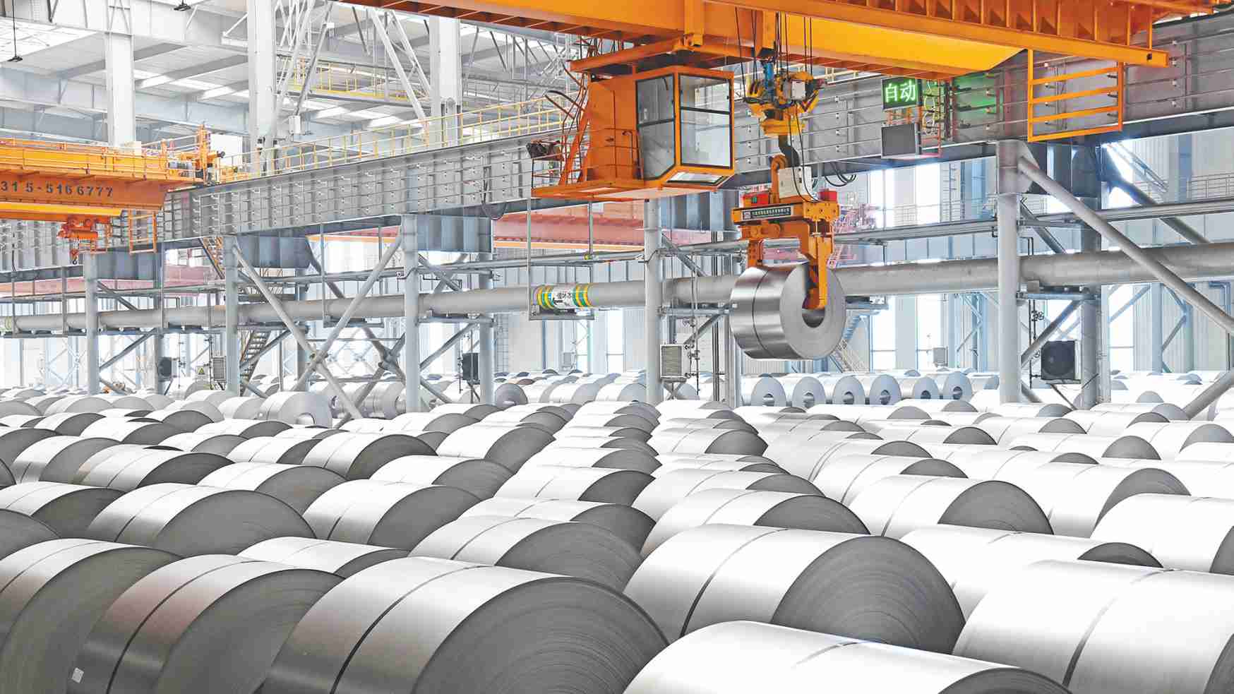 走进钢厂港口看5g与传统工业融合5g让操控无人天车像玩游戏