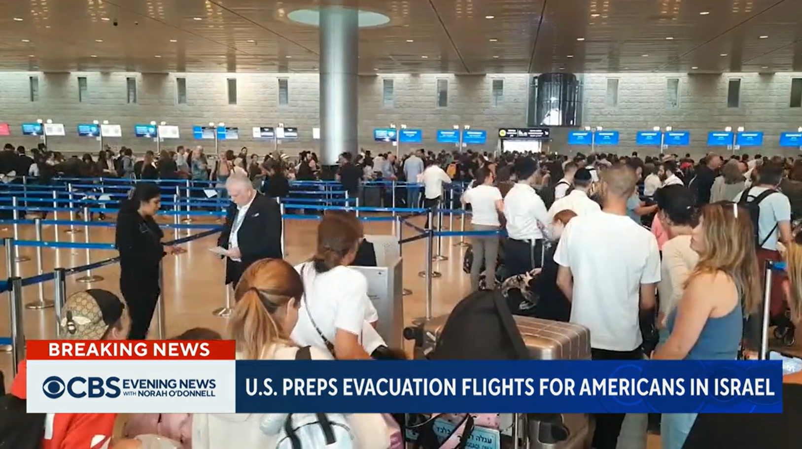 美国哥伦比亚广播公司（CBS）13日关于“美政府安排包机撤离在以色列美国人”的视频报道截图