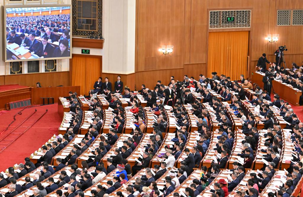 3月9日，十四届全国人大四次会议在北京人民大会堂举行第二次全体会议。（新华社）