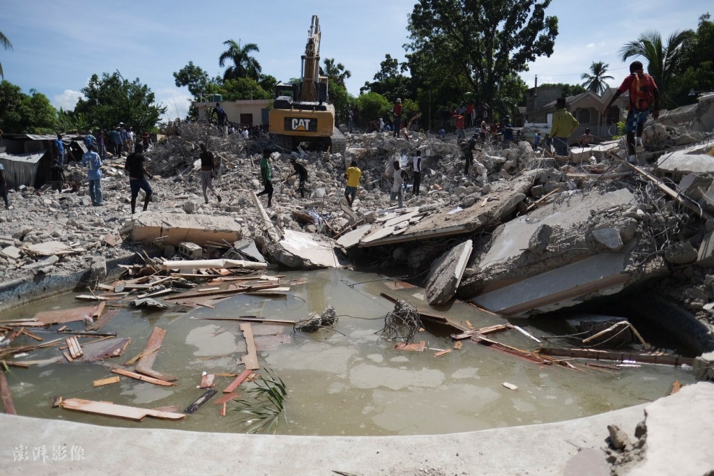 海地地震死亡人数升至1419人另有6000人受伤